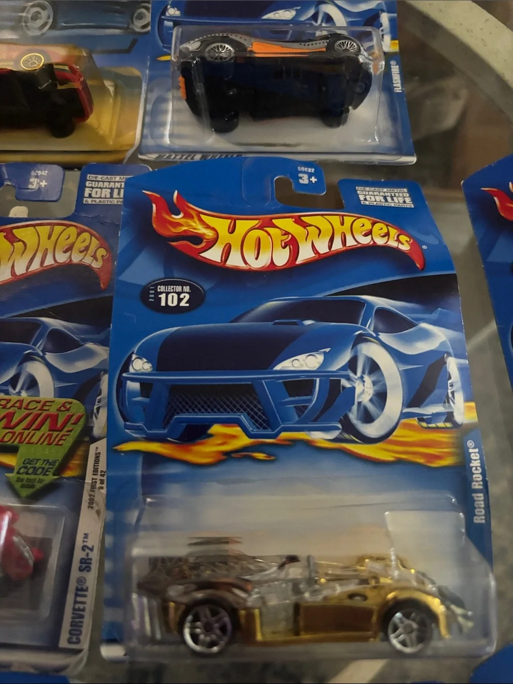 10 Hot Wheels cars in packaging